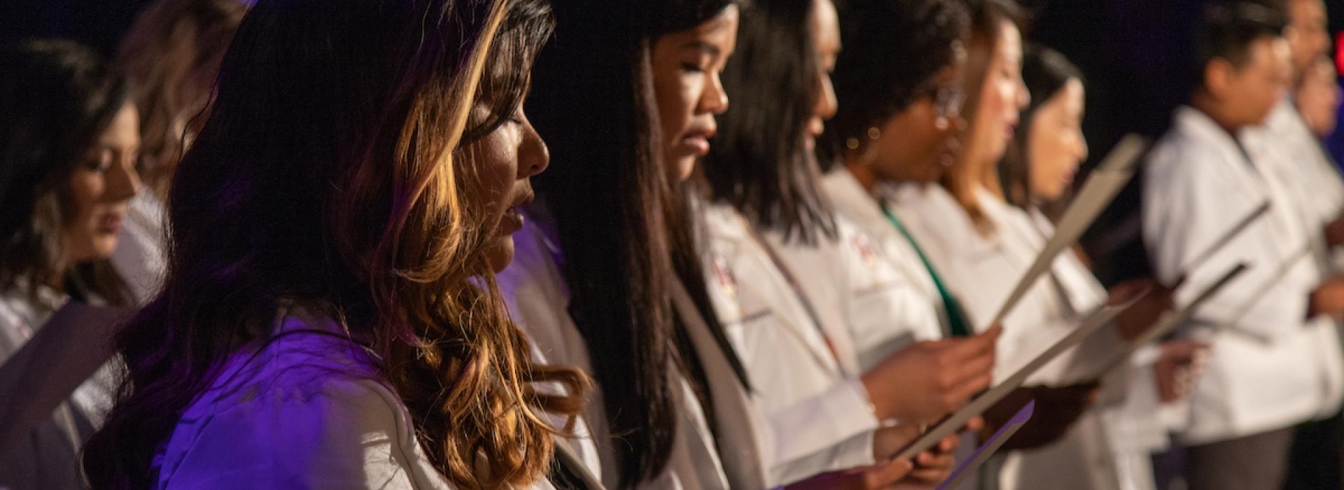 Students reading the Oath during White Coat Ceremony