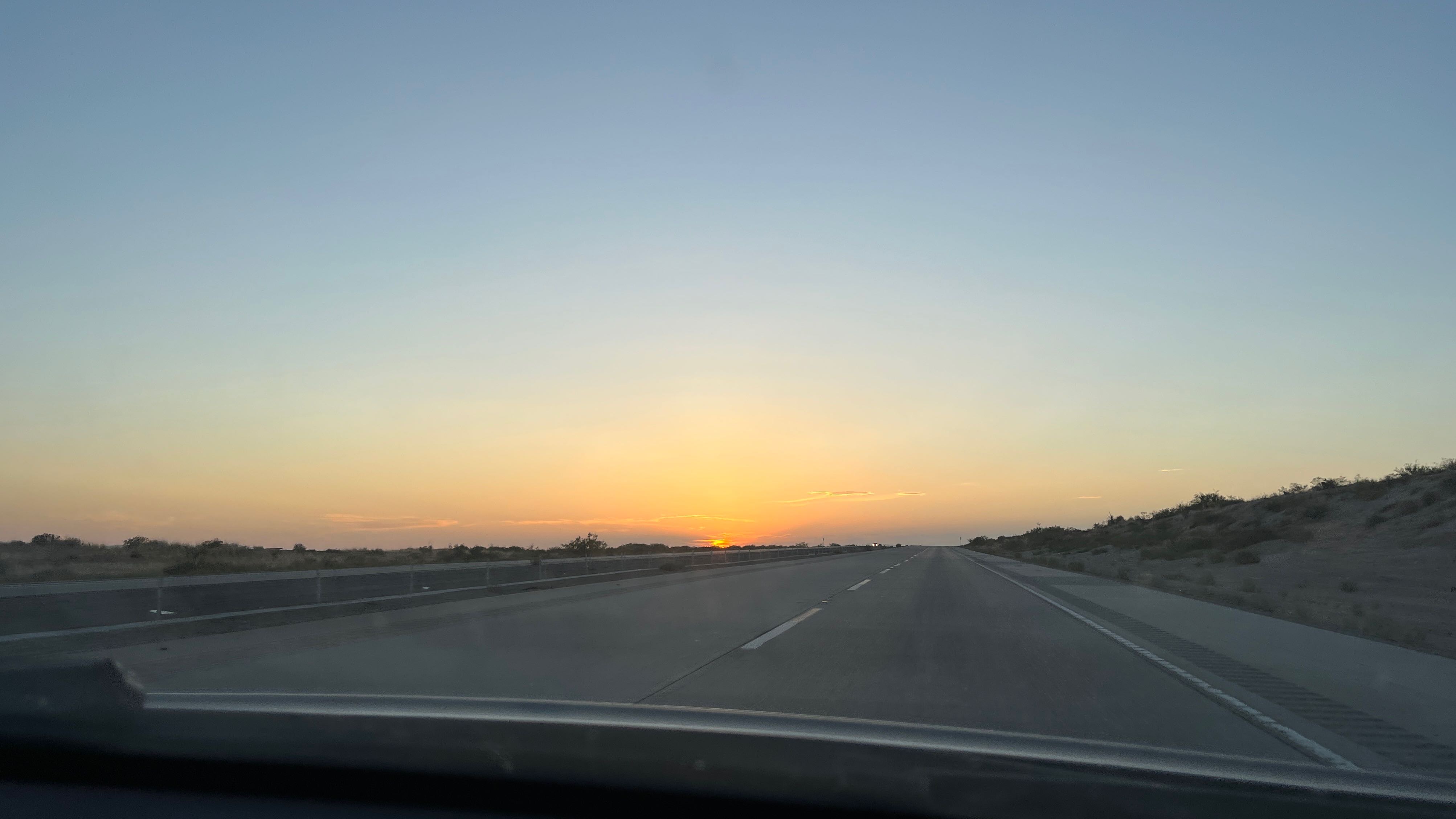 Photo of sunset on a highway