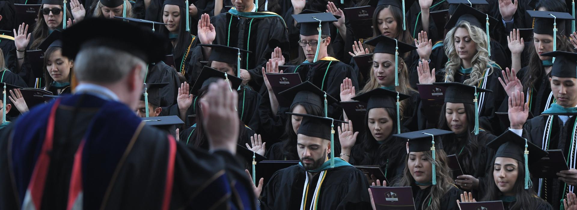 SCCO Graduates take the oath during their commencement ceremony